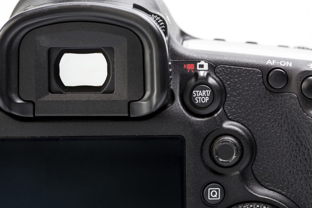 Professional modern DSLR camera - detail of the top LCD with set